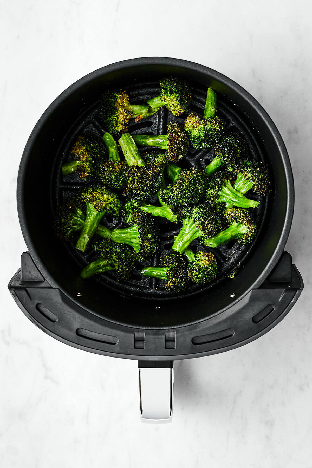 Air fryer broccoli in basket