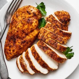 A plate of air fryer chicken breasts