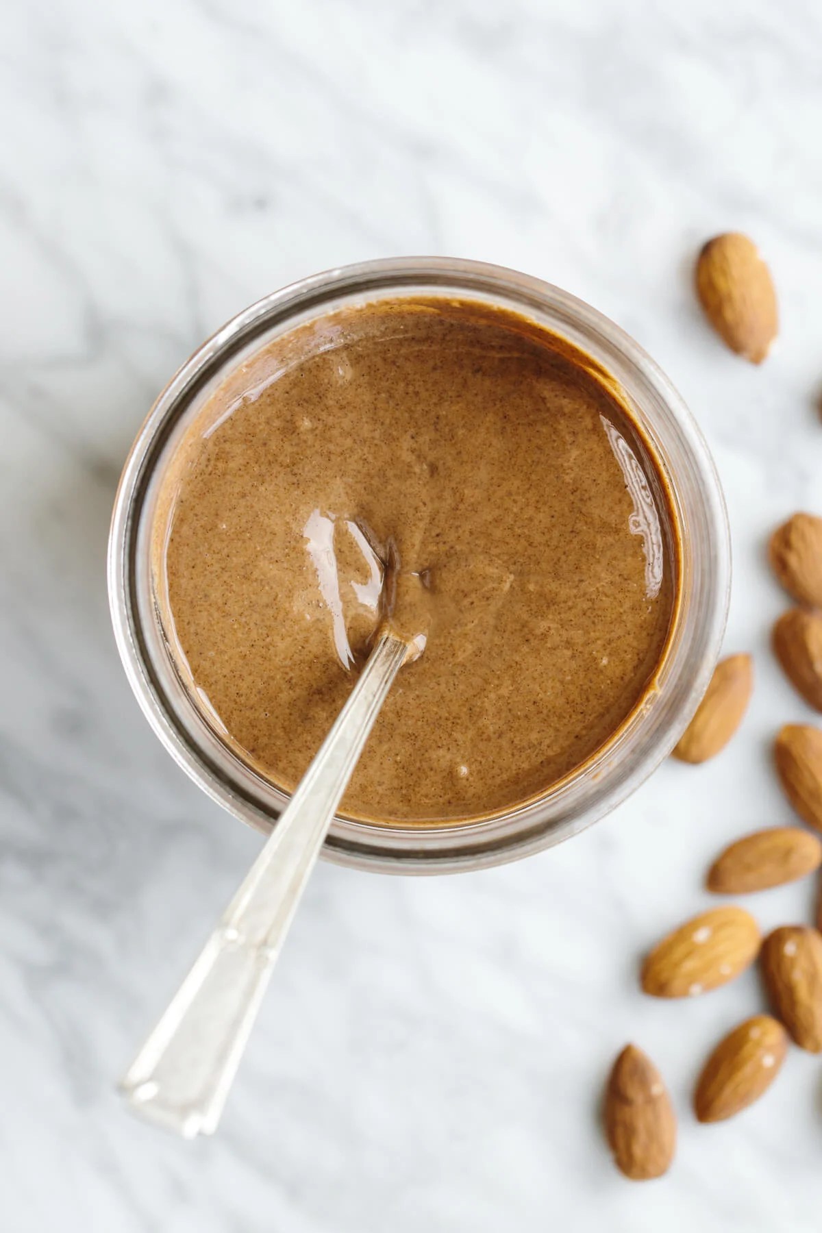 Almond butter in a glass jar.