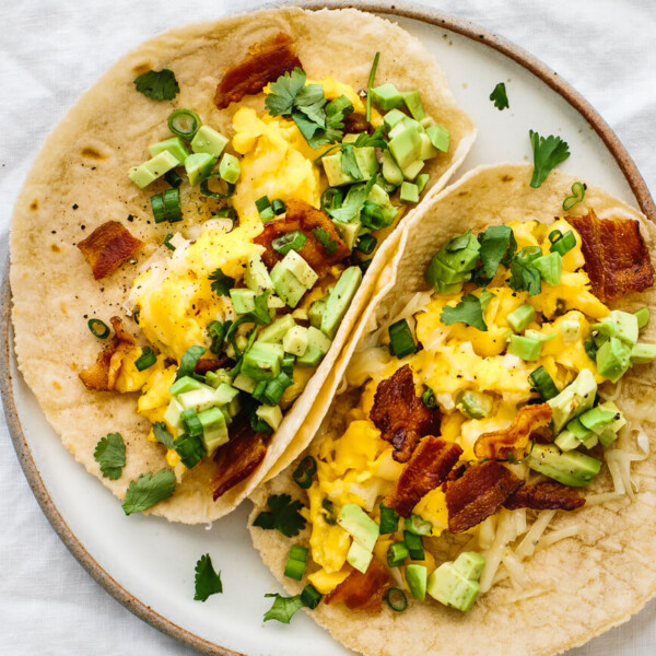 Two breakfast tacos on a plate.