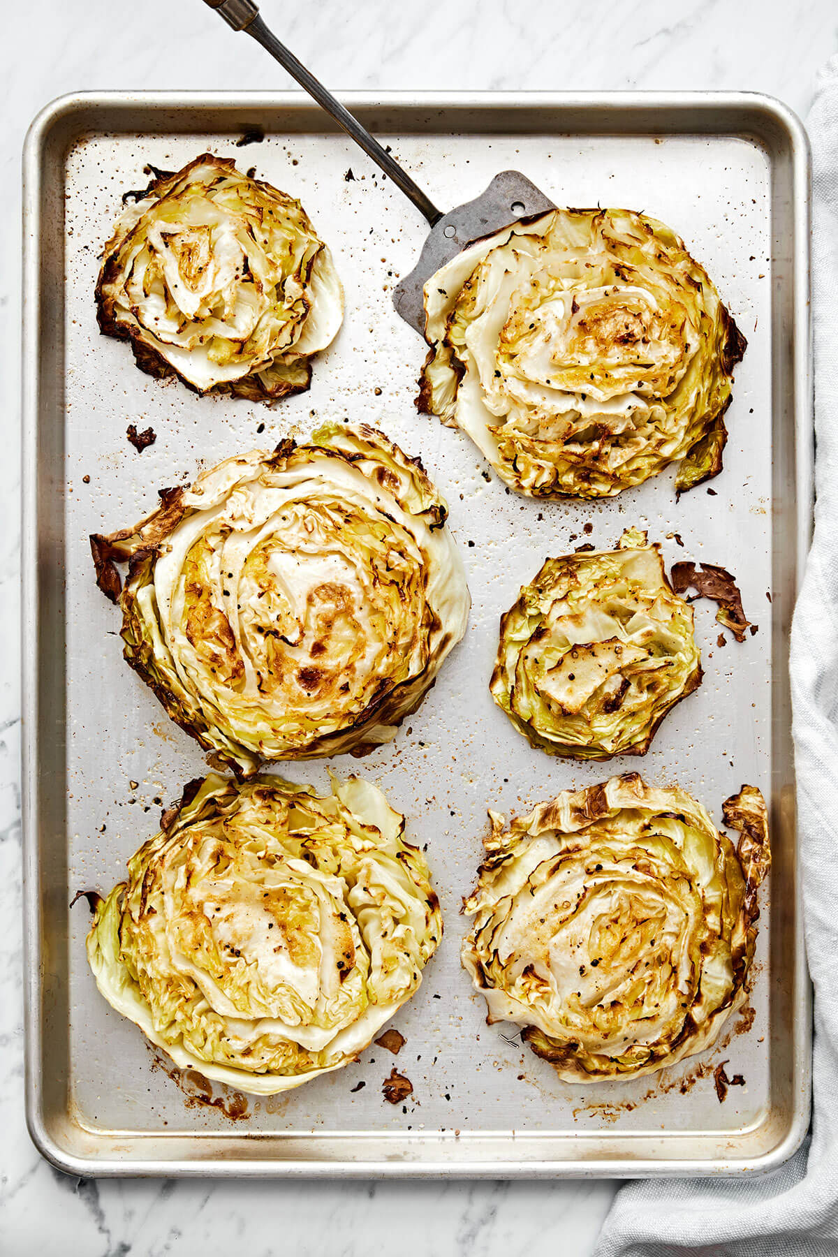 Cabbage steaks on a sheet pan