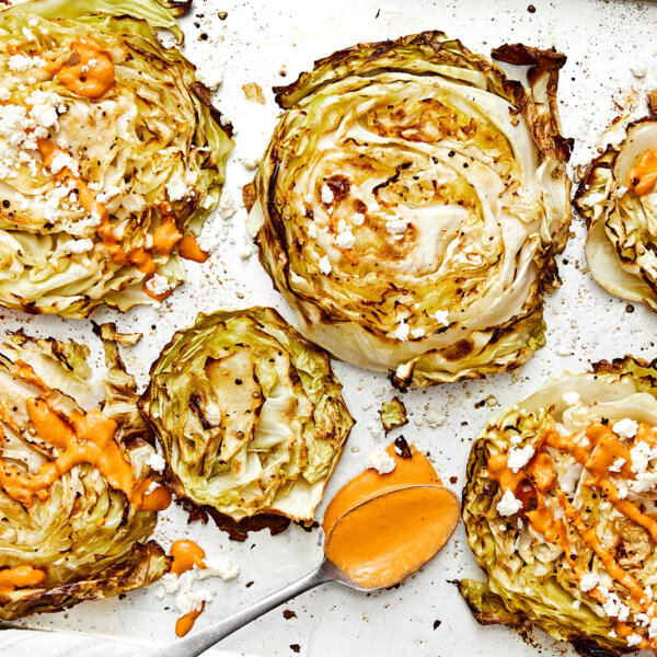Cabbage steaks with sauce and cheese