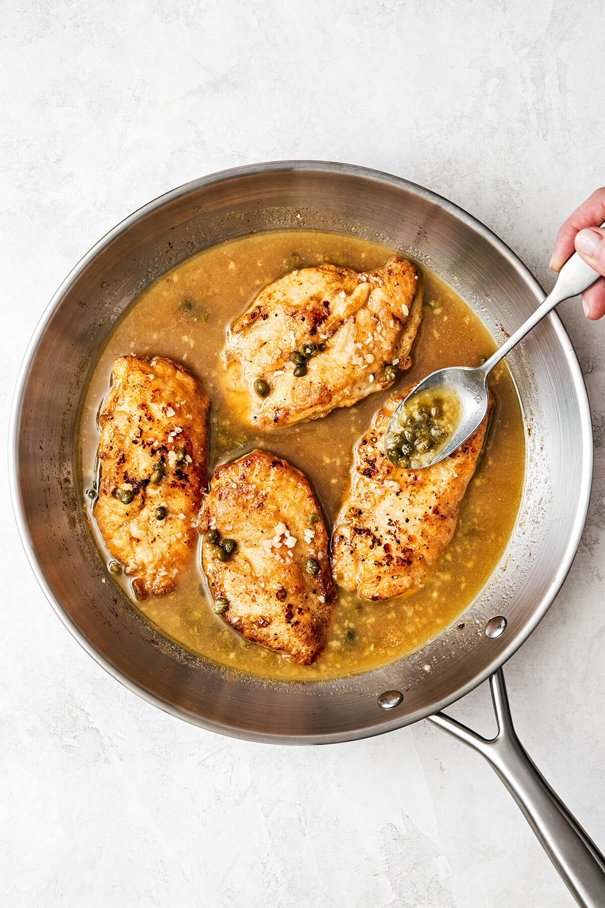Chicken piccata in a pan