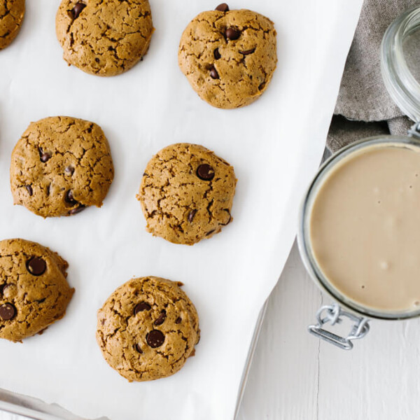 These flourless chocolate chip tahini cookies are gluten-free, nut-free and paleo. They're soft, chewy and utterly delicious. So easy to make! #TahiniCookies #Tahini #ChocolateChipCookies #CookieRecipe #Paleo #GlutenFree