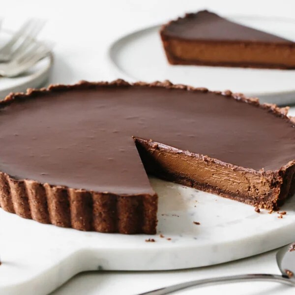 A slice cut from the chocolate tart recipe.