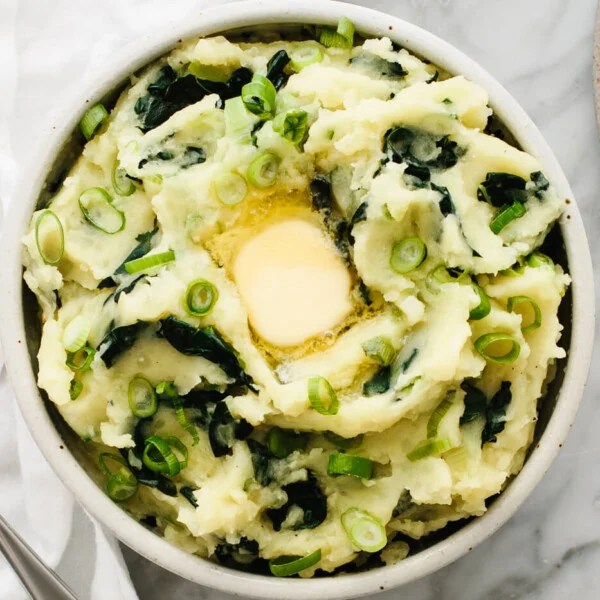 A bowl of colcannon with butter.