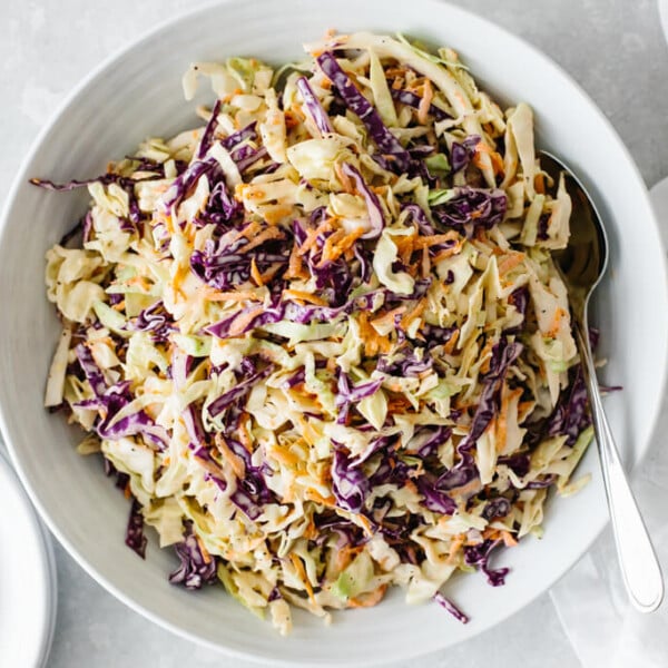 Coleslaw in a white bowl.