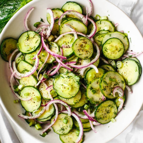 A large bowl of cucumber salad