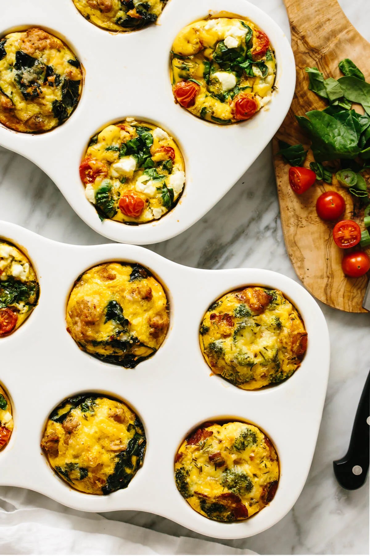A variety of egg muffins on a table.
