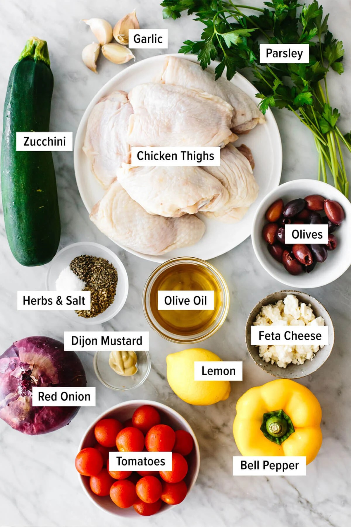 Ingredients for Greek sheet pan chicken.