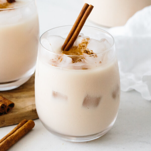 Horchata in a glass with ice.
