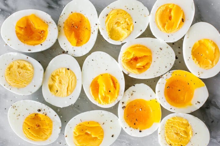 Boiled eggs with salt and pepper on top