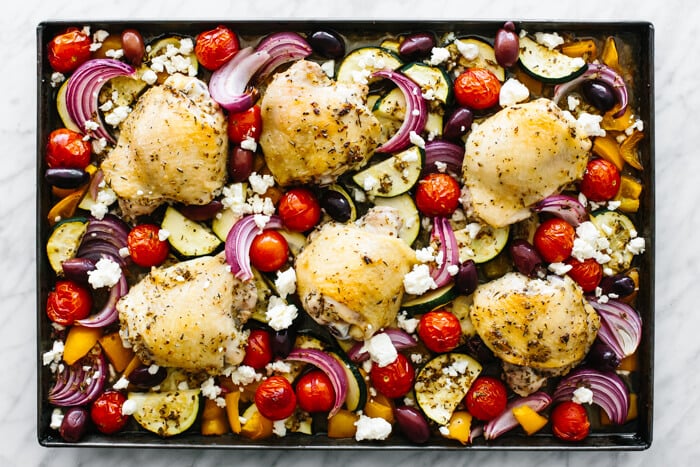 Cooking the sheet pan chicken.