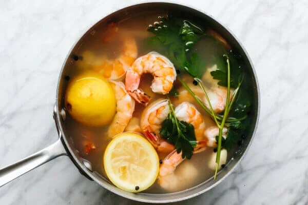 Poached shrimp in a pot for shrimp cocktail