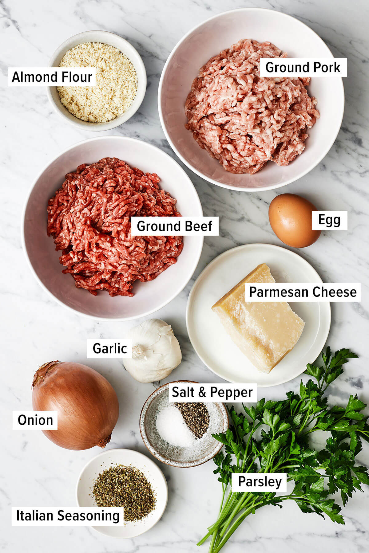 Ingredients for baked meatballs on a table