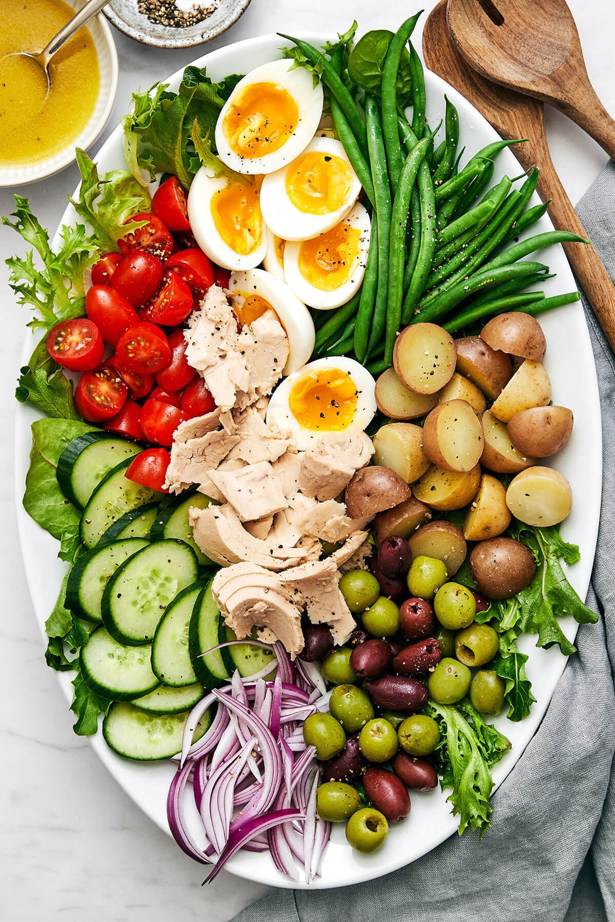 A large platter of Nicoise salad