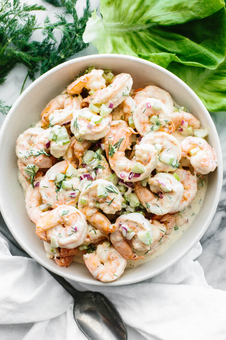 Shrimp salad in a large white bowl