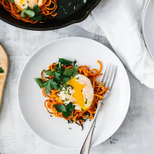 Spiralized sweet potato egg nests (and other vegetable nests) are a simple, delicious and healthy breakfast recipe. It's one of my favorite spiralizer recipes and it's perfect for a weekend breakfast or brunch.