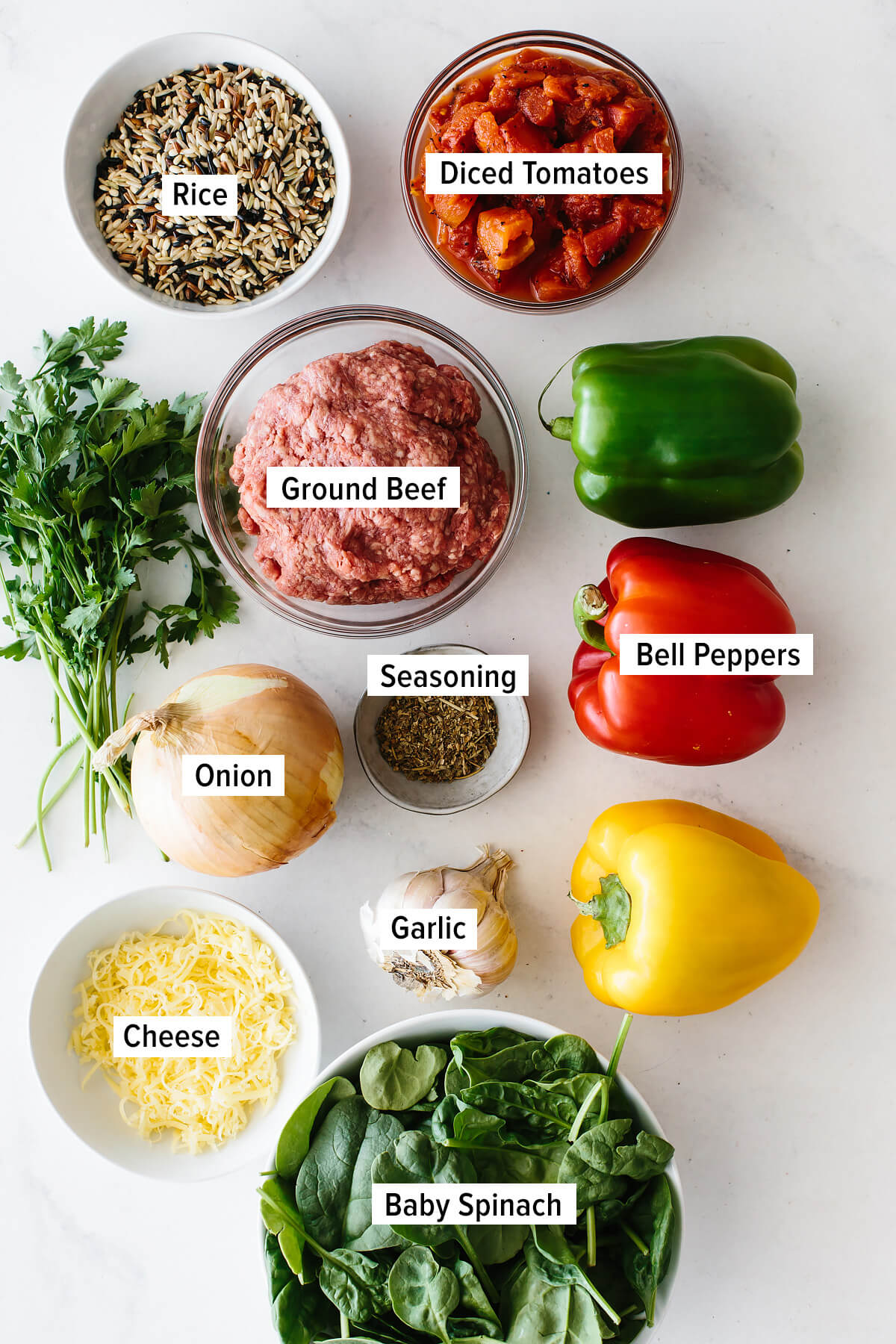 Ingredients for stuffed peppers on a table.
