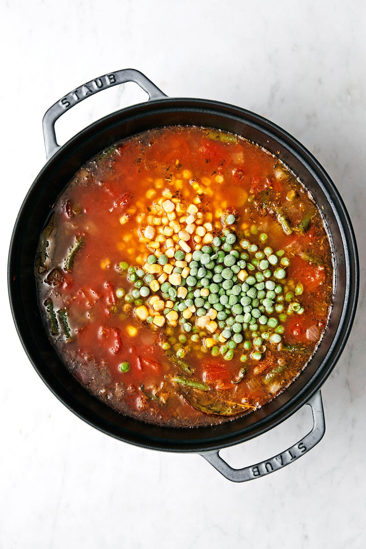 Cooking vegetable soup in a pot