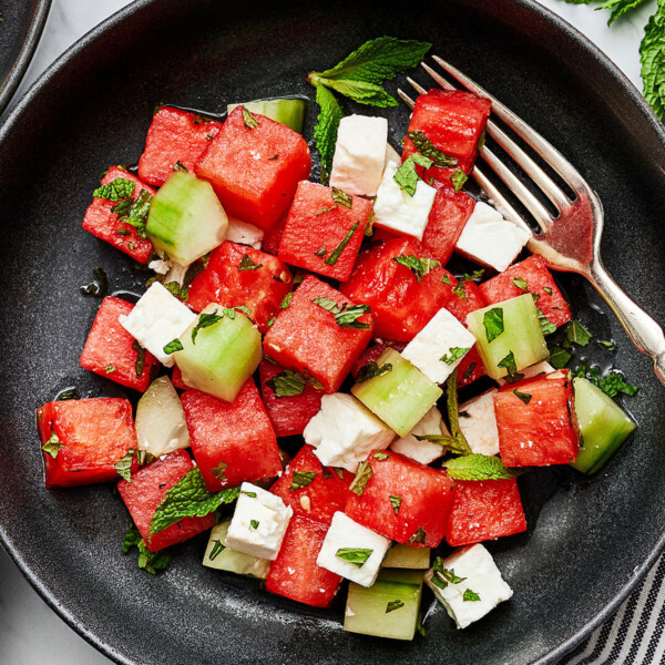 A bowl of watermelon salad with feta and mint