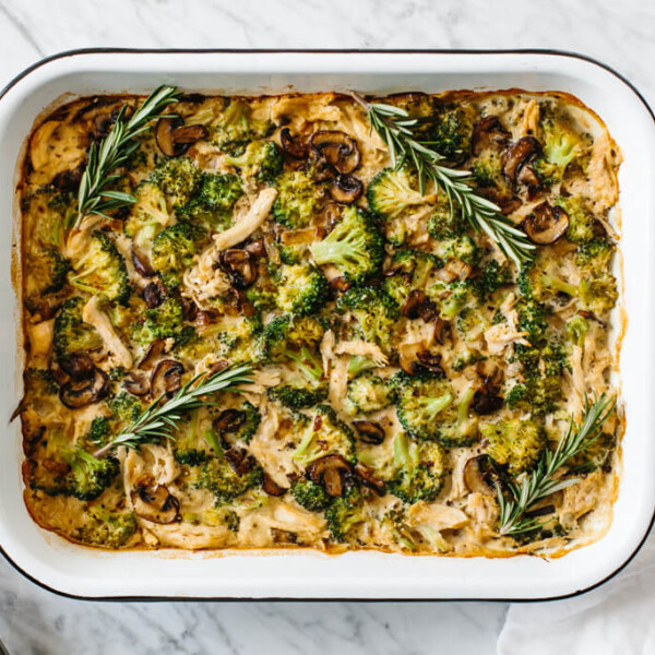 Whole30 casserole recipe with shredded chicken, sautéed mushrooms and broccoli, then topped with my Vegan Alfredo Sauce for an easy and healthy weeknight dinner. It's also a dairy-free and paleo casserole recipe.