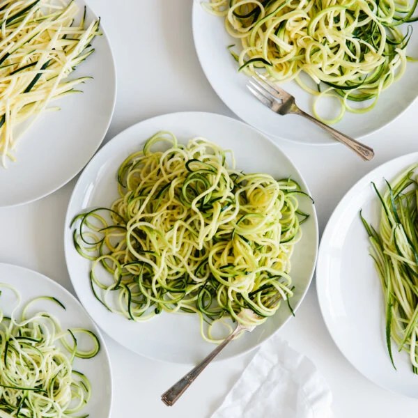 Several plates of zucchini noodles